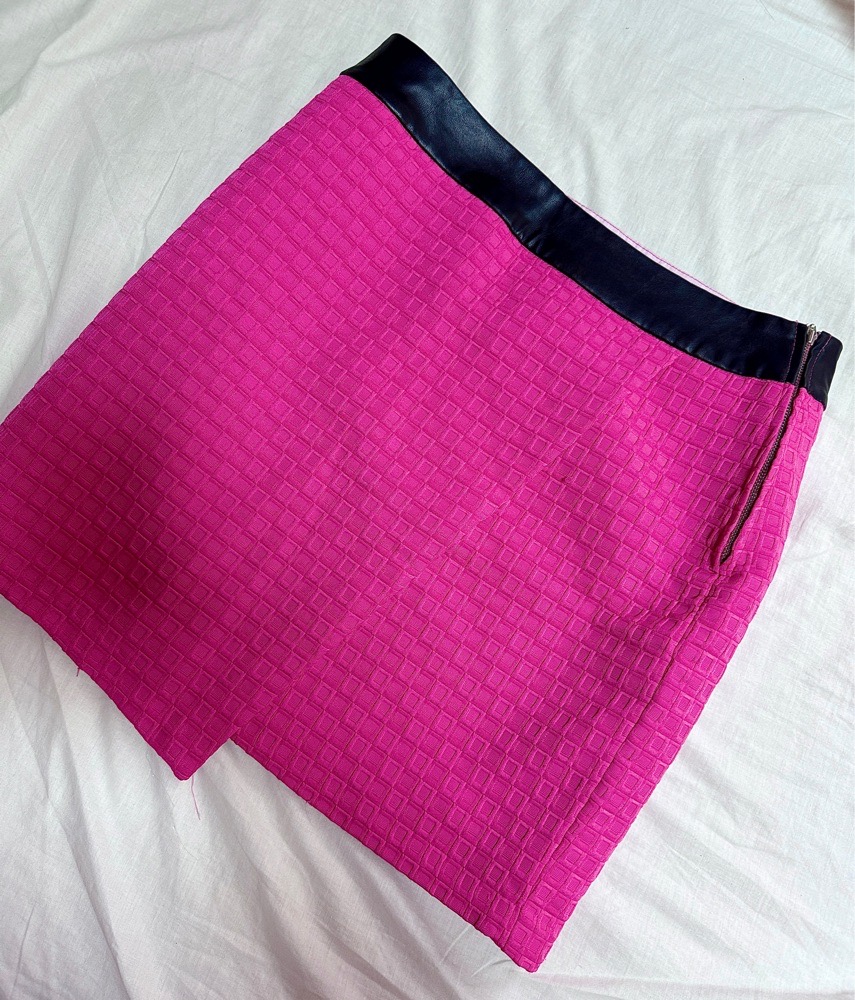 Très belle mini jupe rose fushia