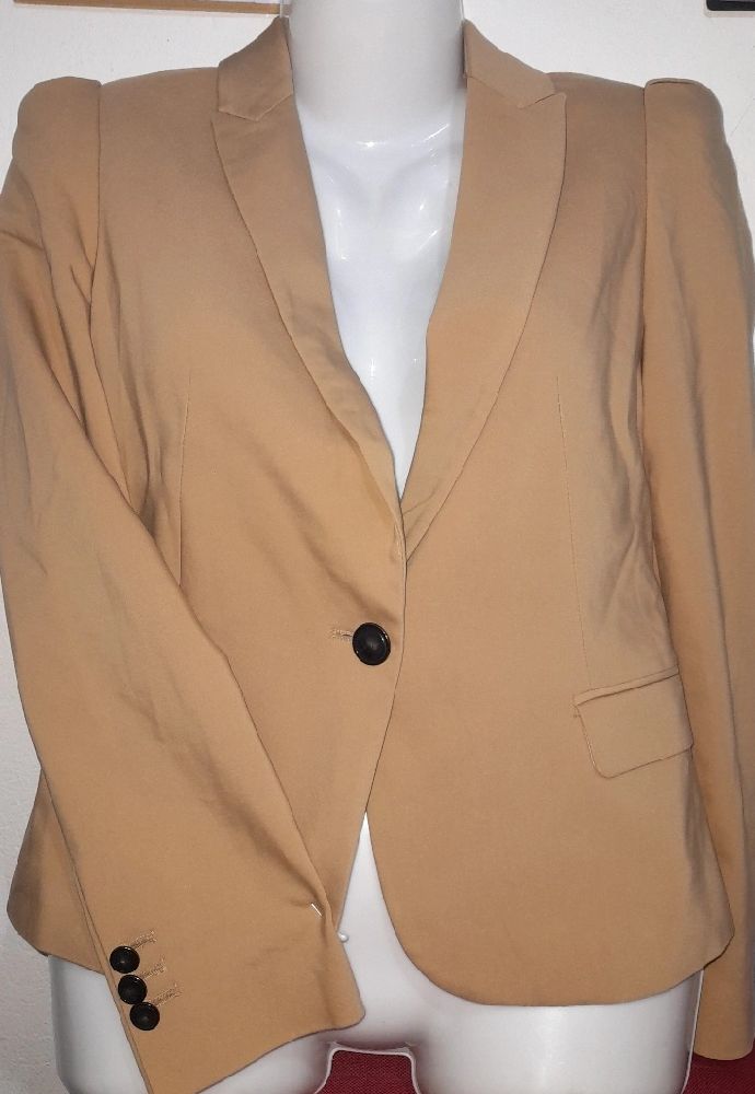 trois vestes