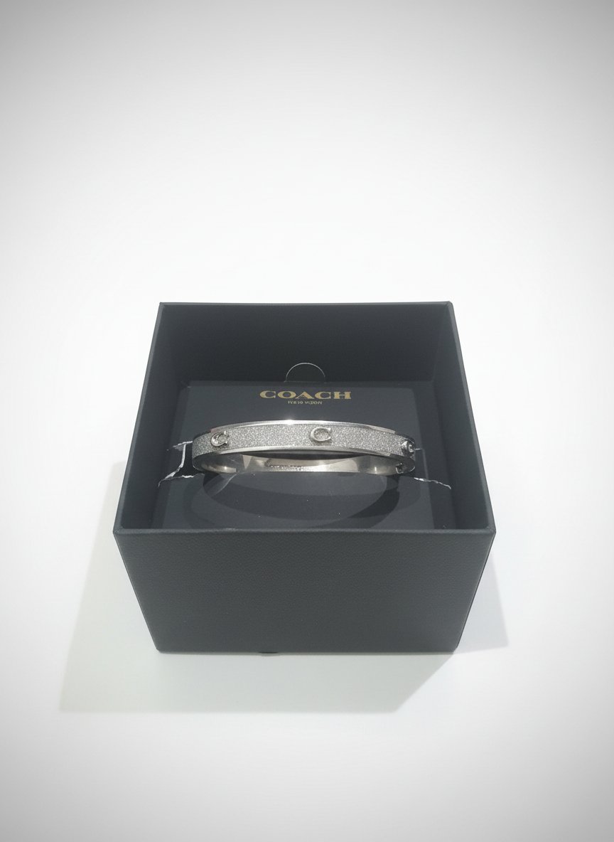 Bracelet coach original avec son paquet 