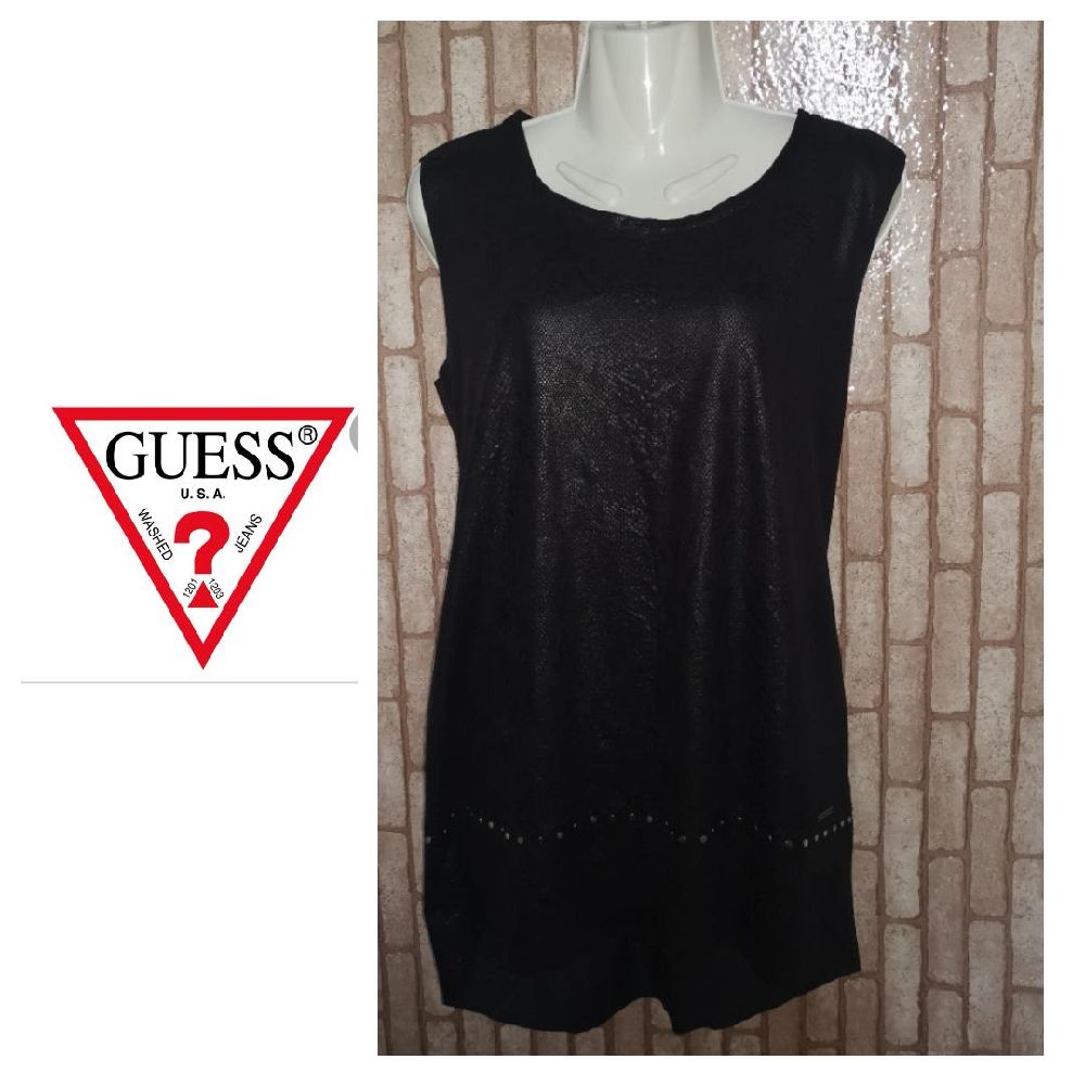 robe de la marque GUESS très  classe et chic taille S/36 