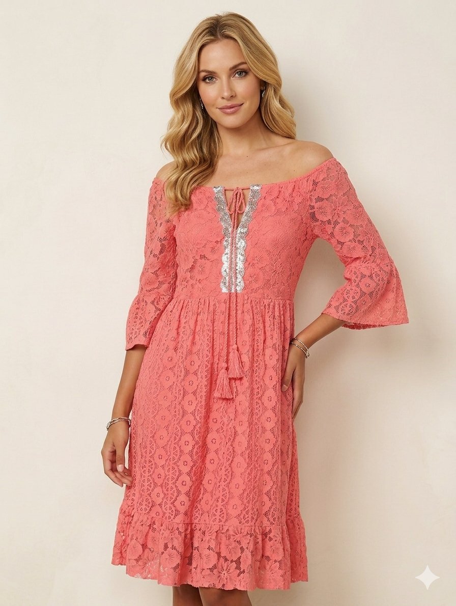 Très belle robe saumon en dentelle 