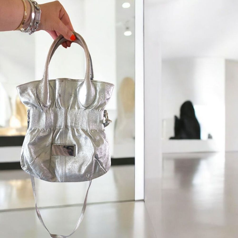 Sac couleur Argent en cuir. Coccinelle. 