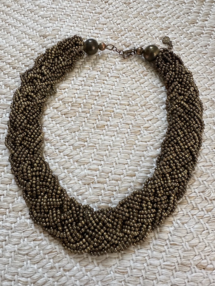 collier bronze en très bon état 