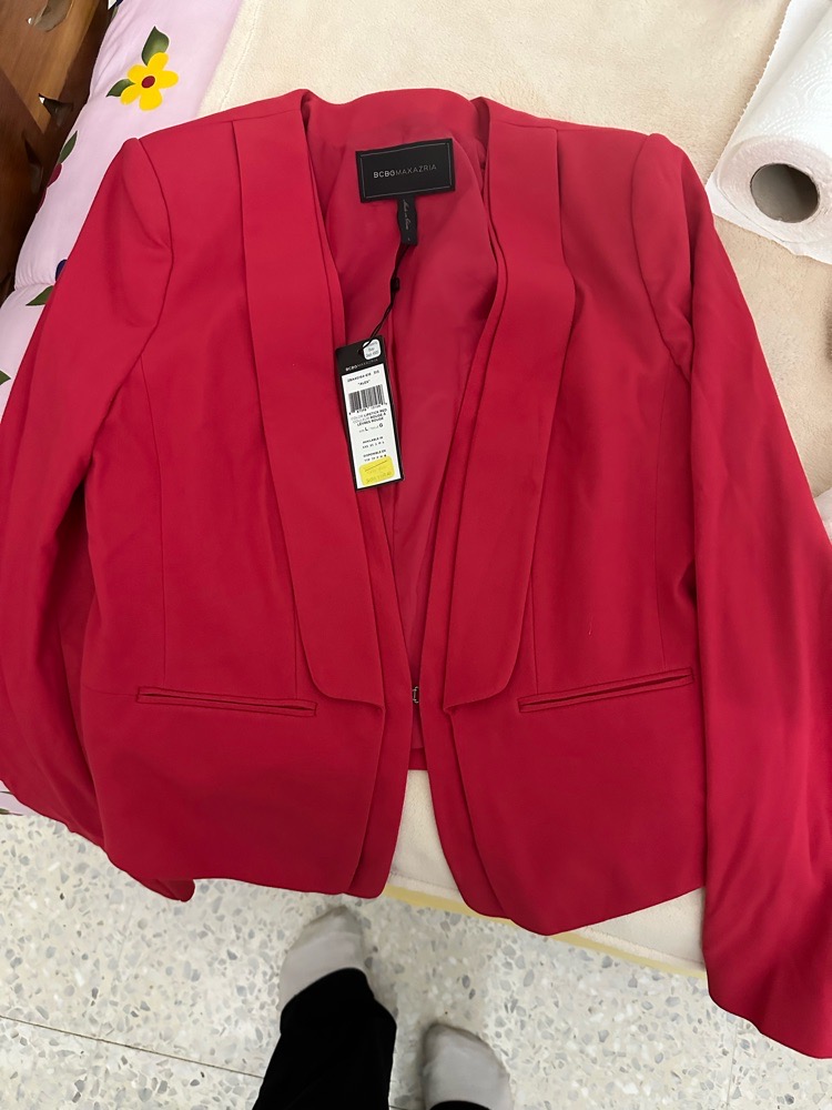 Veste rouge jamais porte taille L