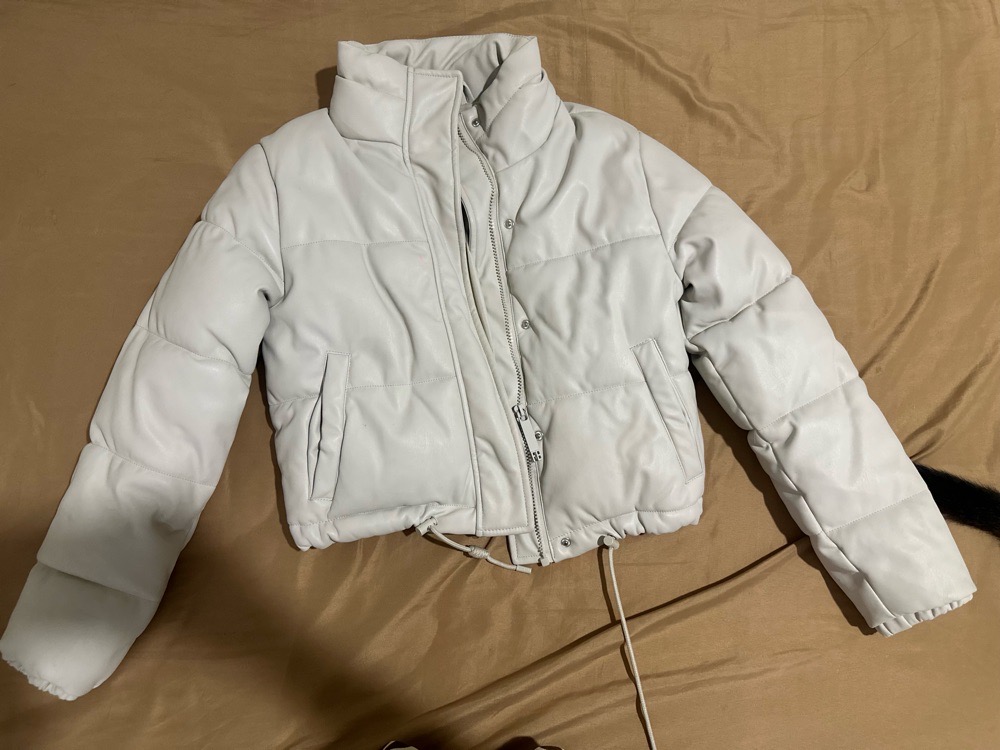 Manteau tres bon etat juste il ya une tache de fluo 