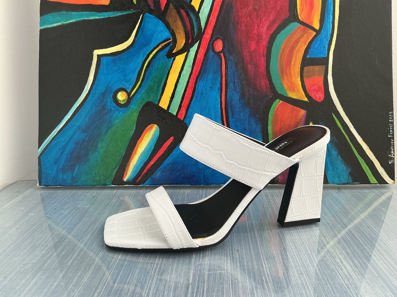 Mules blanches tres elegantes 