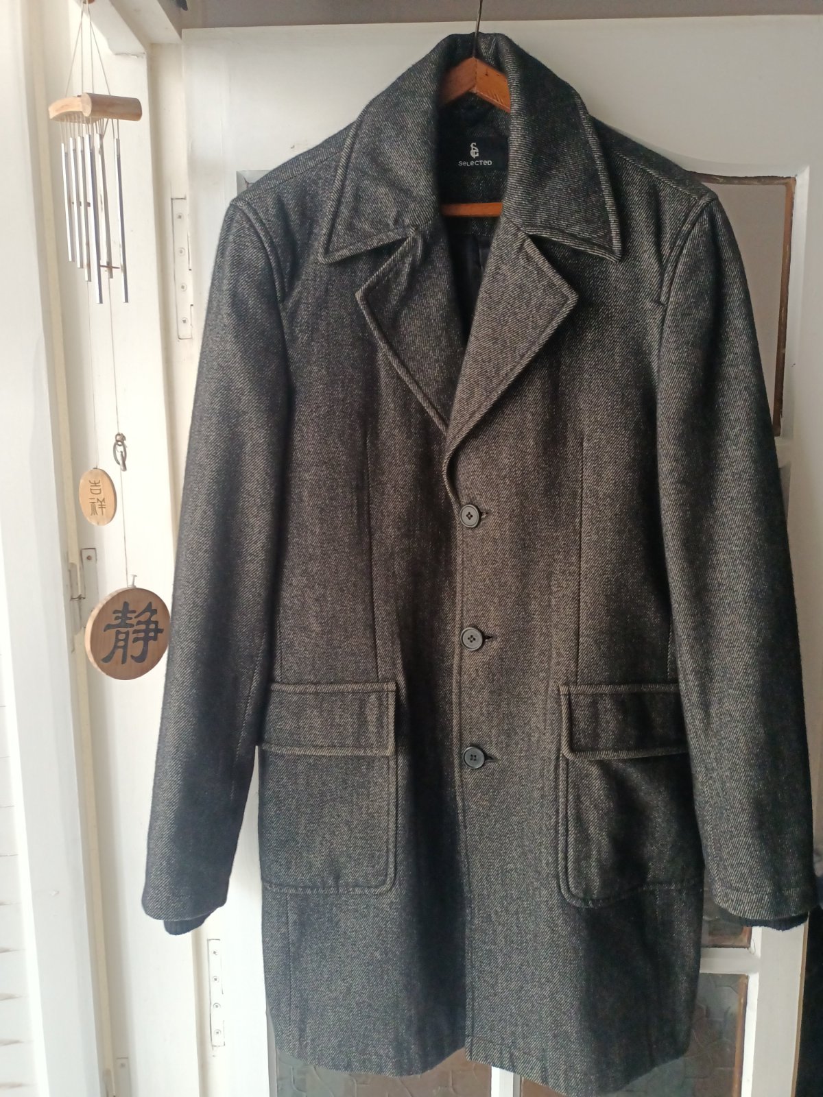 A men's single-breasted car wool blend coat by the brand Selected classic outerwear, suitable for both formal and casual setting .