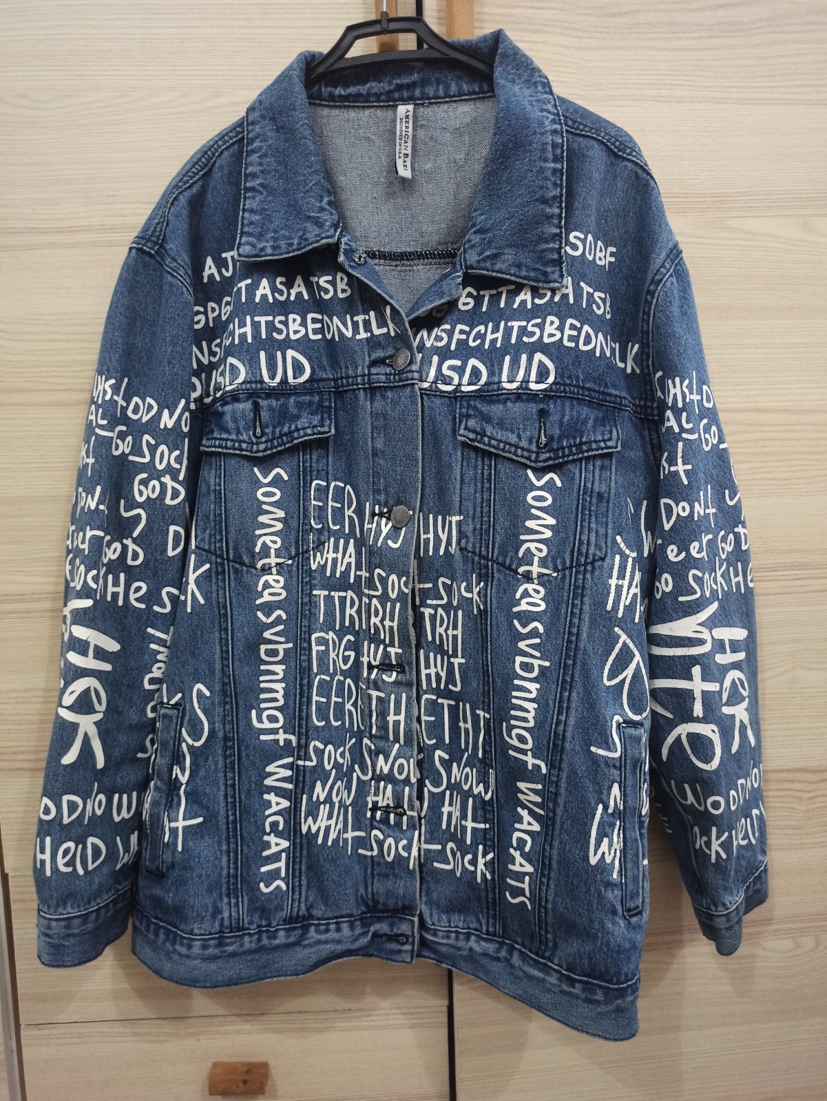 Veste en jean avec inscriptions