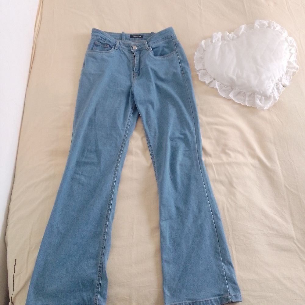Clear flared jeans 
