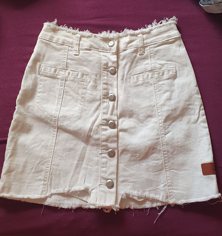 Lot de 2 jupes, 2 shorts et un top