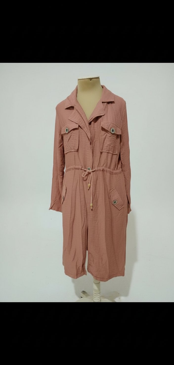 Un joli gilet mi long en état parfait la taille L/XL 