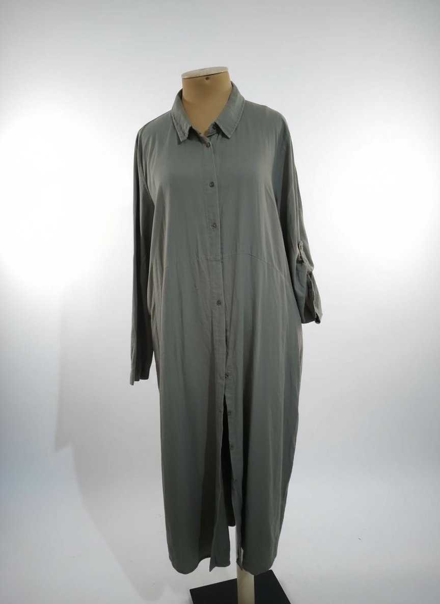 Une jolie robe chemise en bon état la taille44 / 46