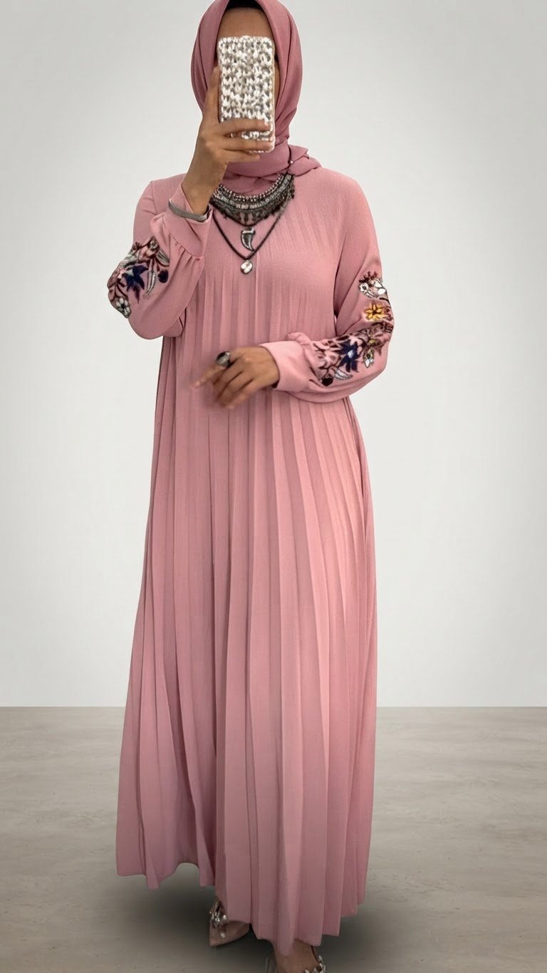 Une jolie robe rose poudrée état parfait portée une fois la taille L/XL/XXL 