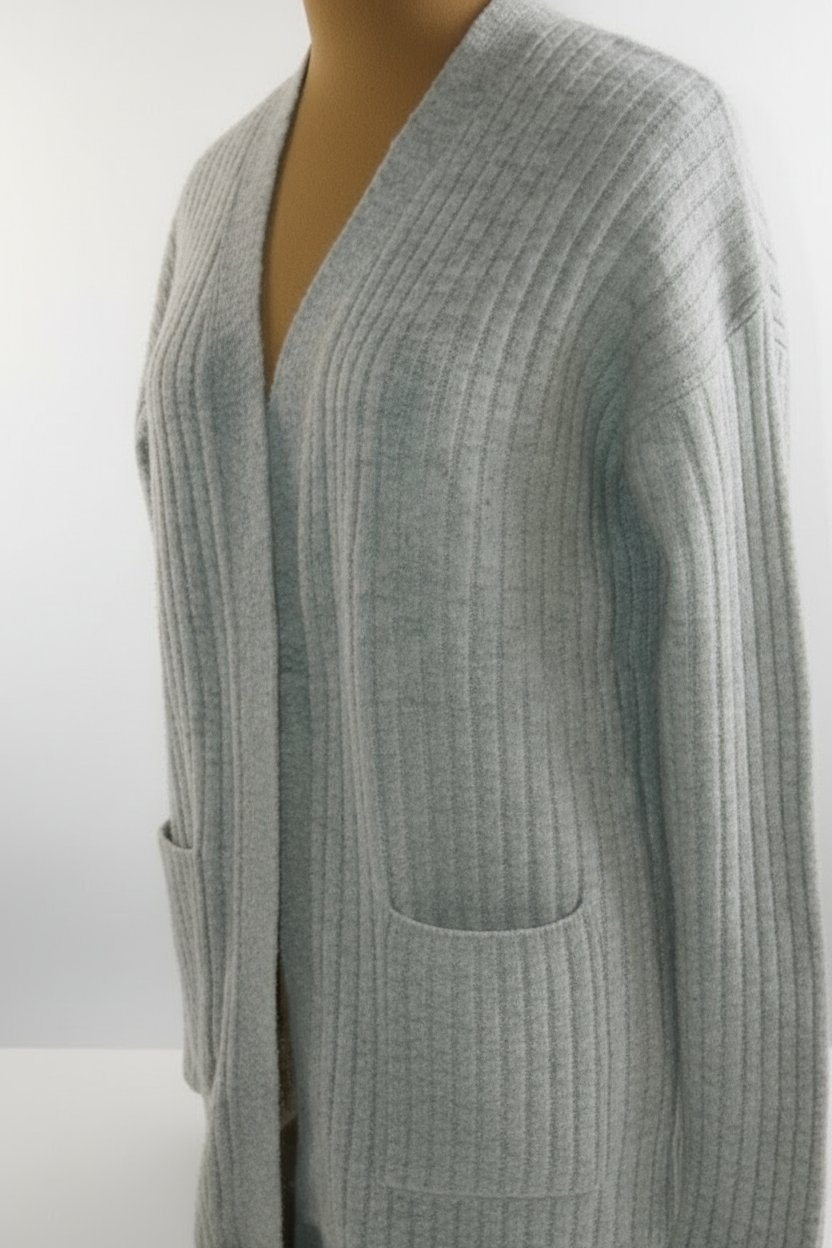 Un joli gilet longue la marque Garcia laine khchina état extra la taille 40/42/44