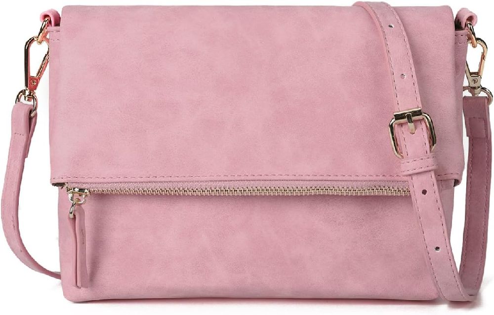 Un joli sac pochette avec bandoulière rose jamais porté 
