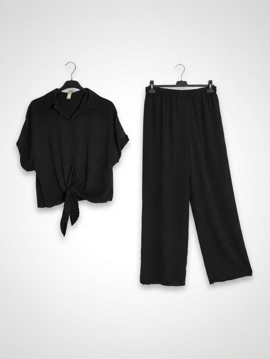 Un joli set noir pratique made in italy état parfait porté une seule fois la taille L/XL/XXL 