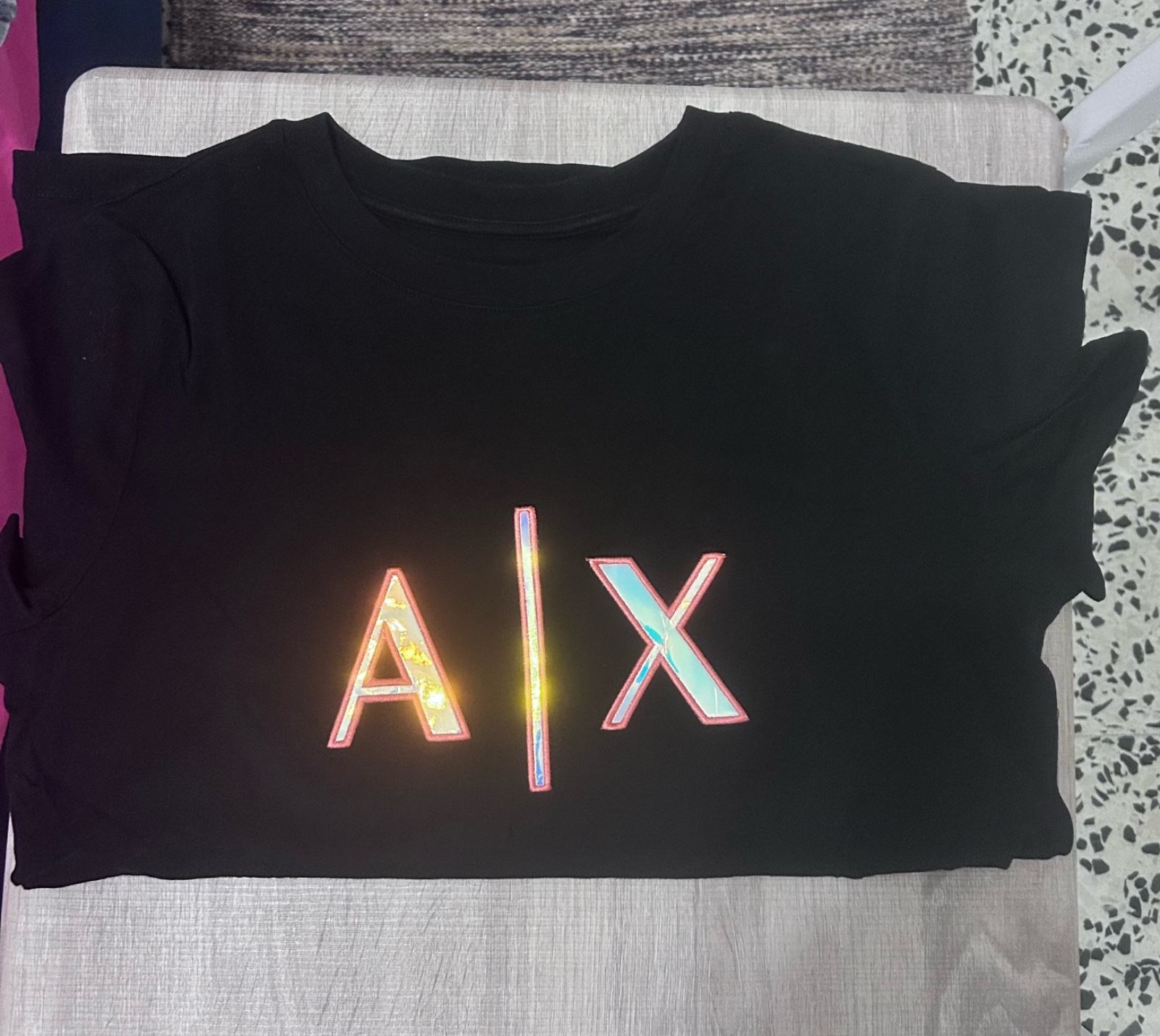 Teeshirt manche courte de la marque Armani exchange en noir  