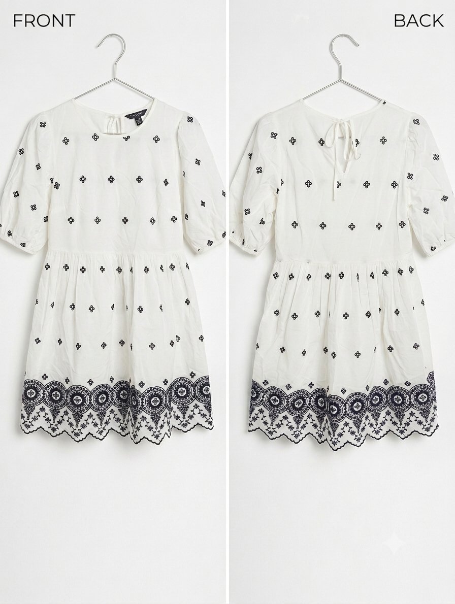 Robe blanche en broderie anglaise 