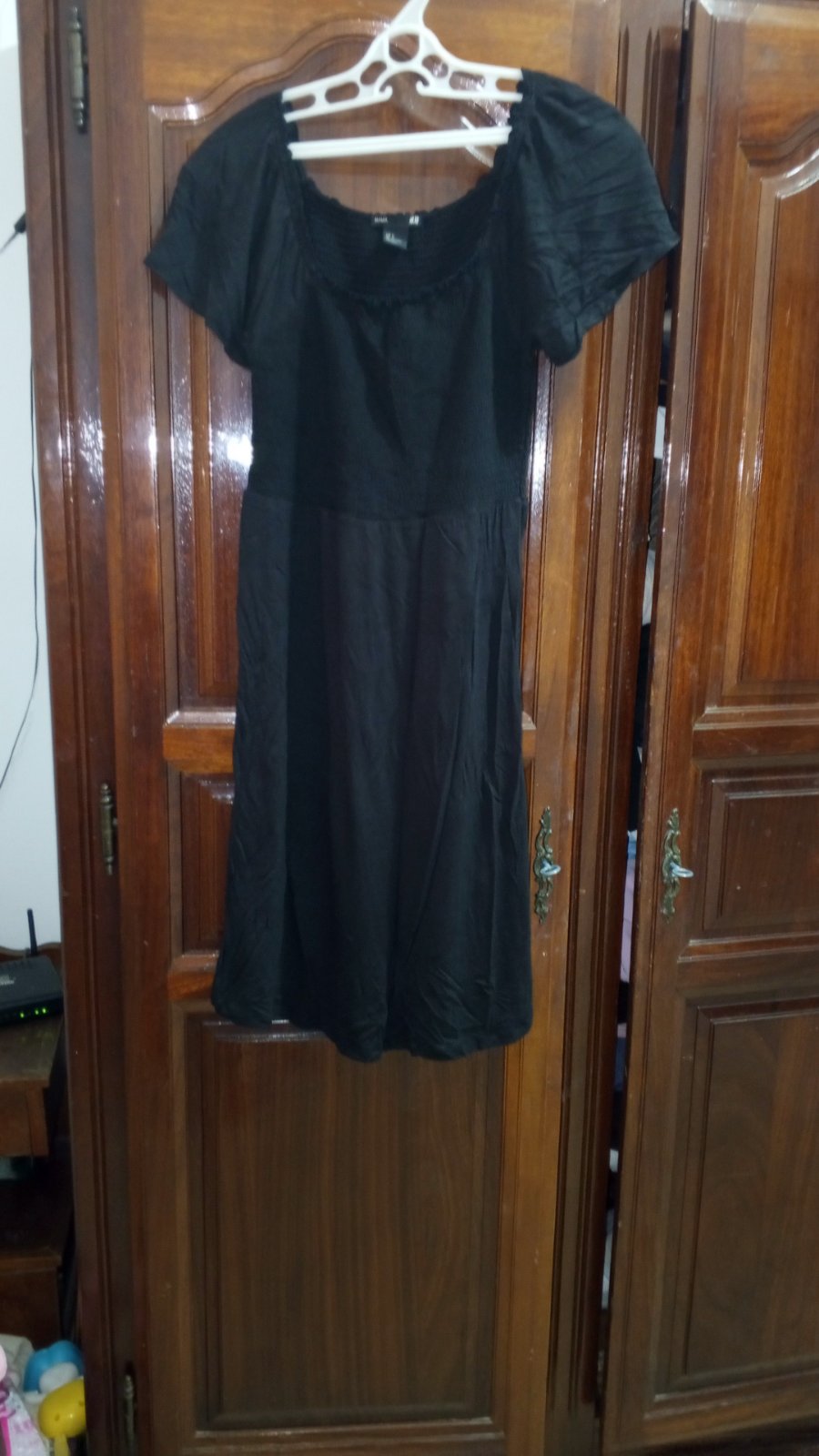 Robe noir avec smoque 