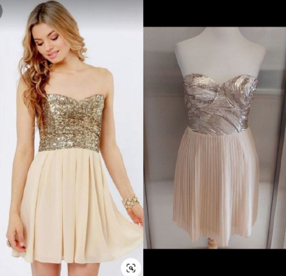 Subliiiiime ❤️ ❤️ ❤️ ❤️ ❤️ robe bustier moitié sequins doré et le bas plissée très élégante comme neuve de DEBY DEBO taille 34/36