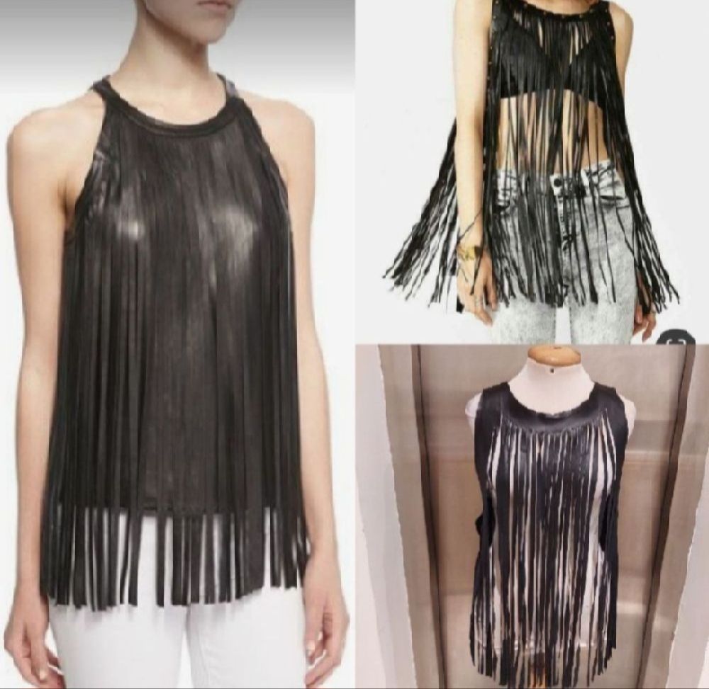 Subliiiiime ❤️ ❤️ ❤️ ❤️ ❤️ débardeur en franges en similicuir fashion de la marque BEBE taille unique 