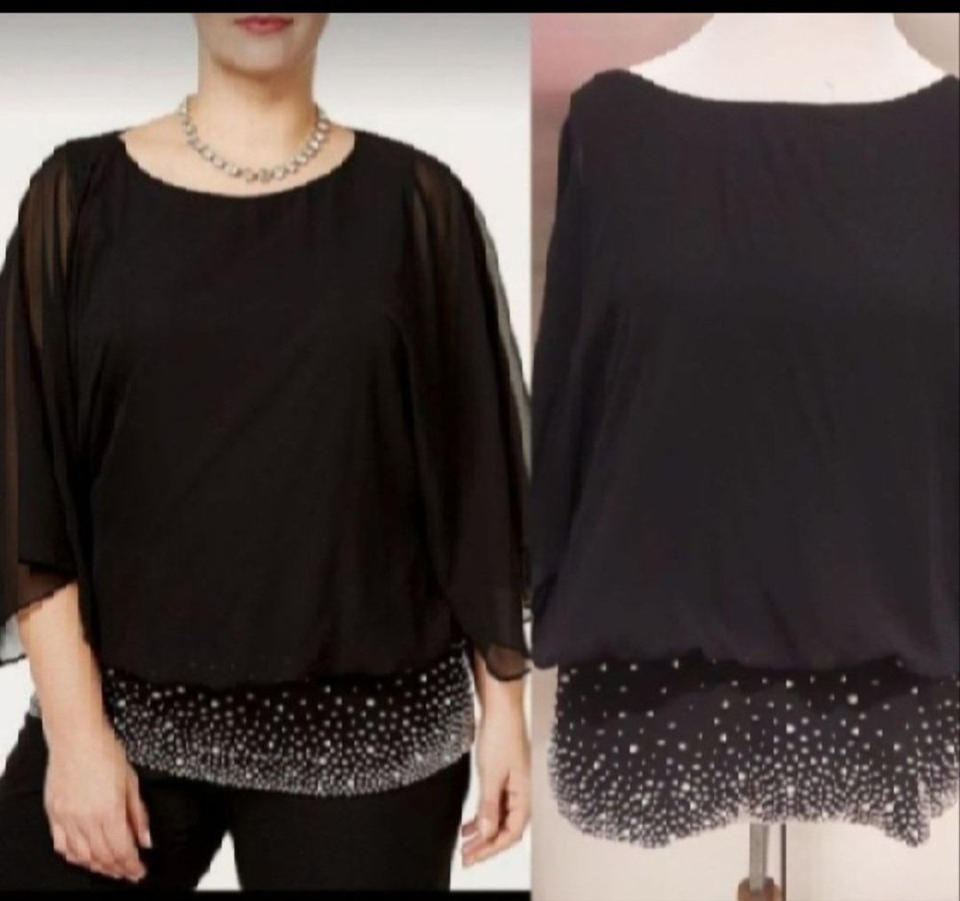 Subliiiiime ❤️❤️❤️❤️❤️❤️blouse en mousseline noir avec des paillettes brillantes en bas taille 42