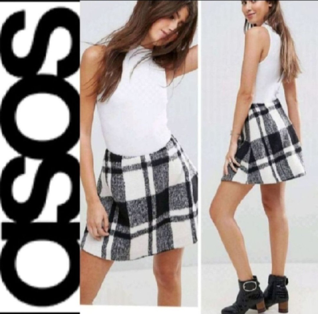 Subliiiiime❤️❤️❤️❤️❤️❤️ jupe évasée à carreaux chaude  de la marque ASOS taille 36