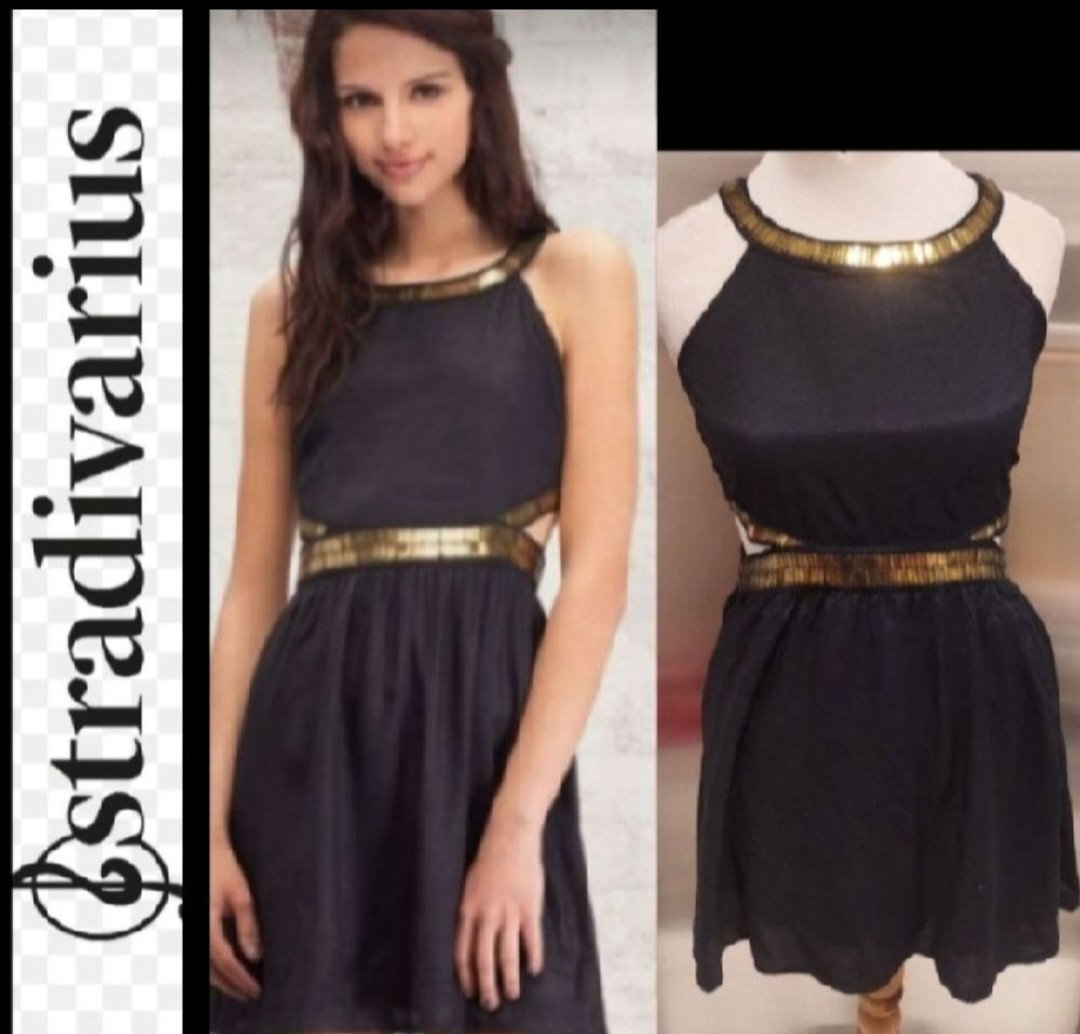 Subliiiiime ❤️❤️❤️❤️robe été à détails doré et ouvertures sur les côtés de STRADIVARIUS taille 38/40