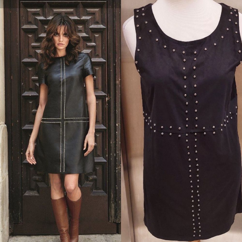 très jolie  robe noire à clous métallique taille 38❤️❤️❤️