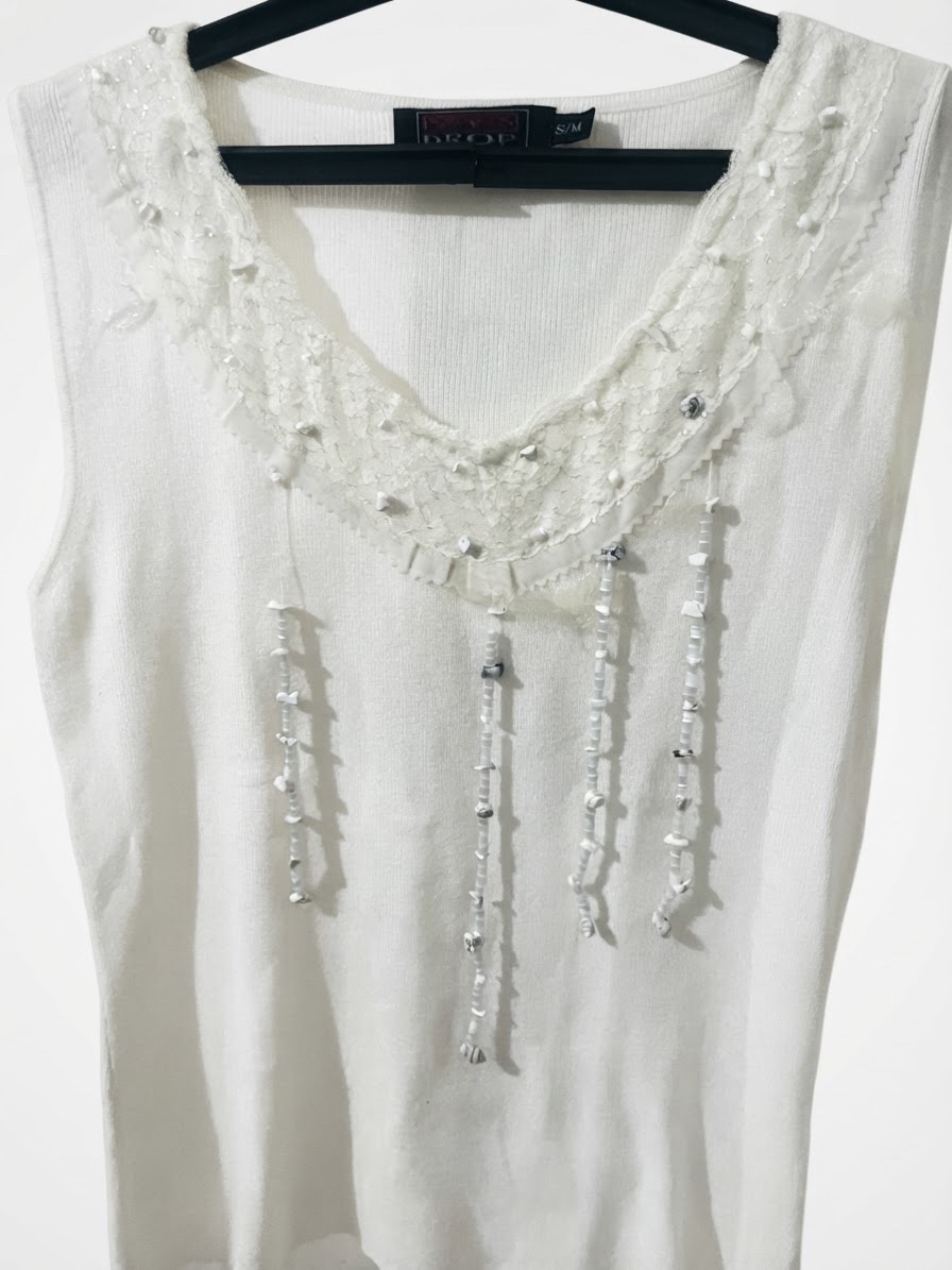 Magnifique debardeur en tricot