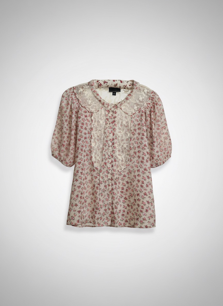 Tres belle blouse a details romantiques