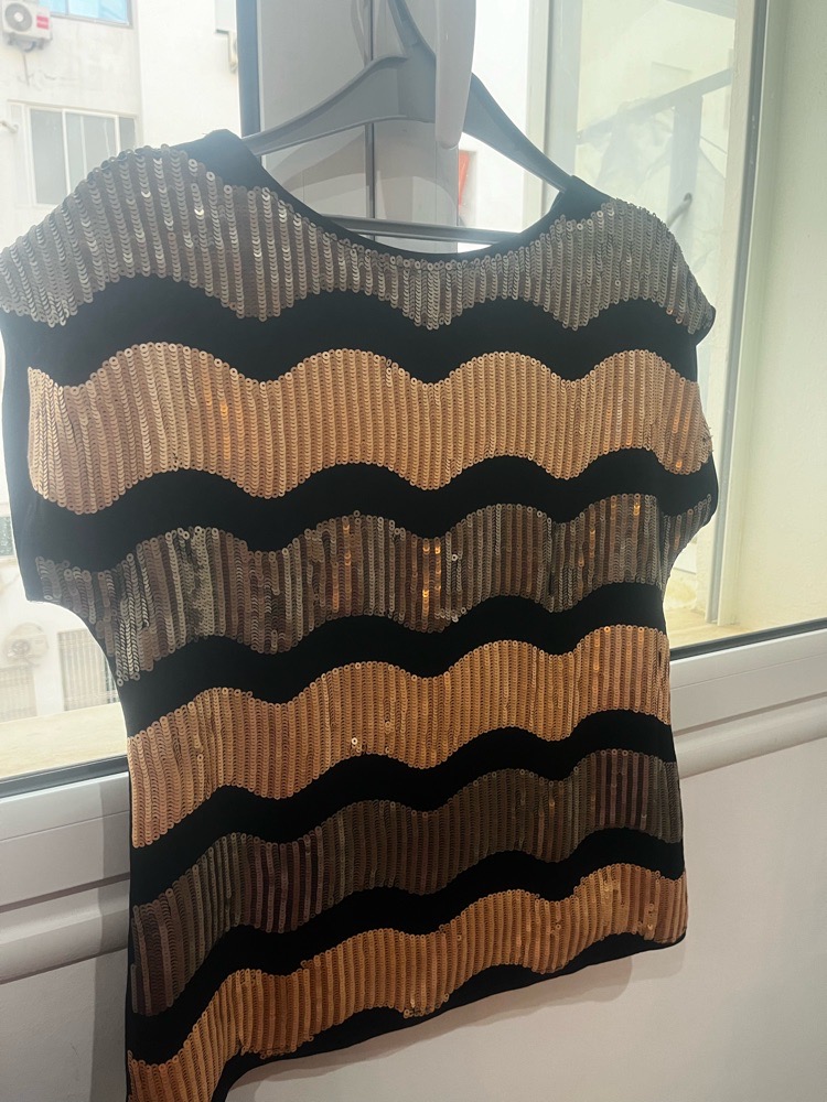 Joli pull importe