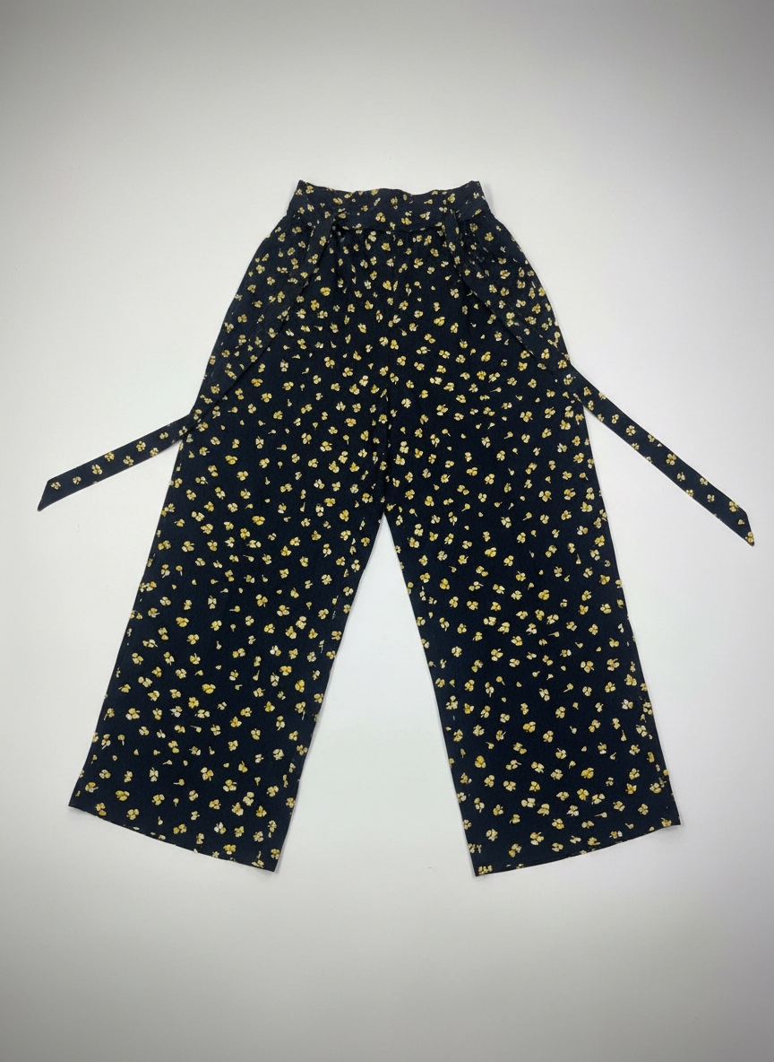 Pantalon bleu marine avec des fleurs jaune