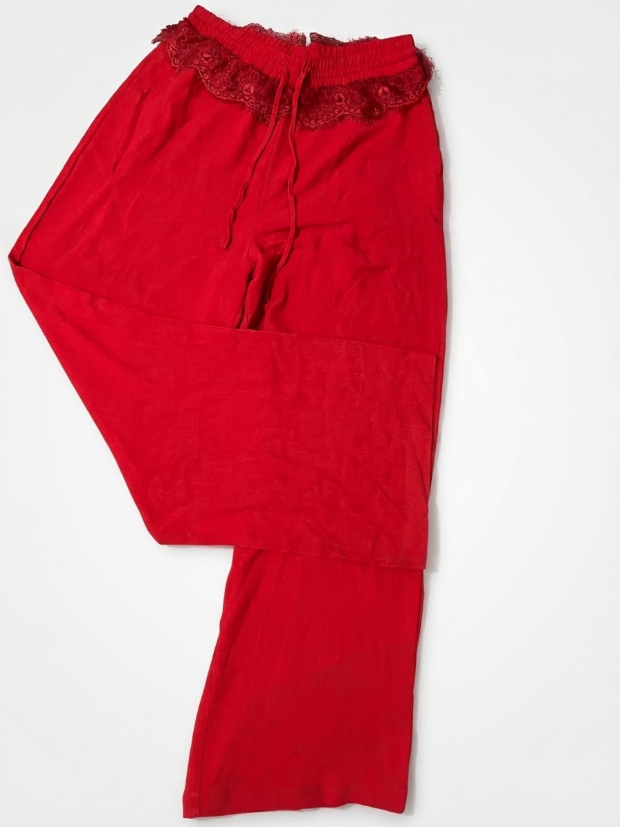 Pantalon fluide rouge vif avec finition dentelle à la taille