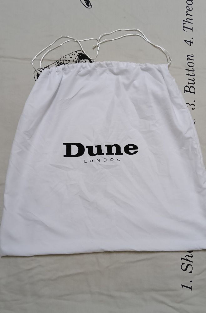 Dust bag Dune  London, etat neuf 