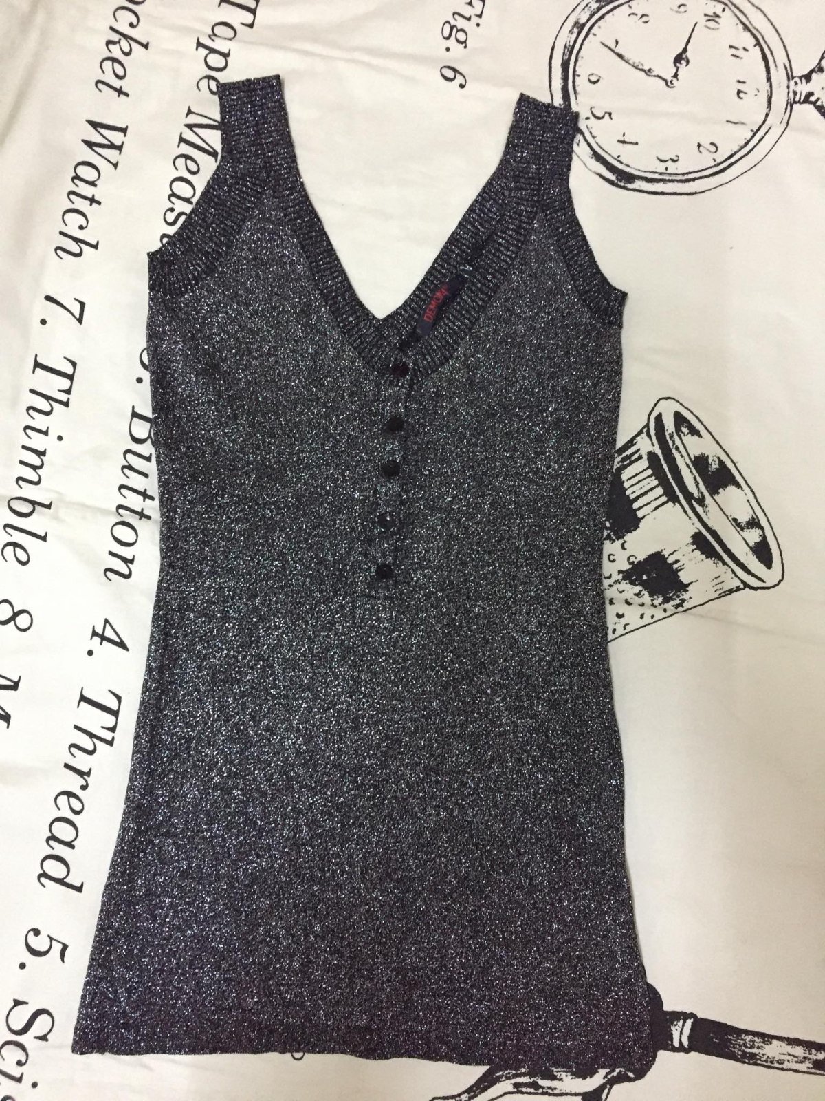 Pull pailleté en argent 