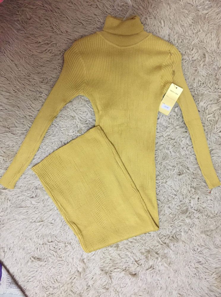 Robe mi longue, importation France 