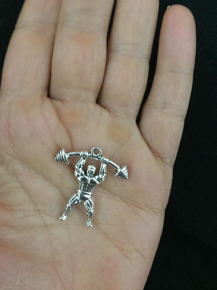 pendentifs importés, pour homme ou femme.   l'unité  a 28dt