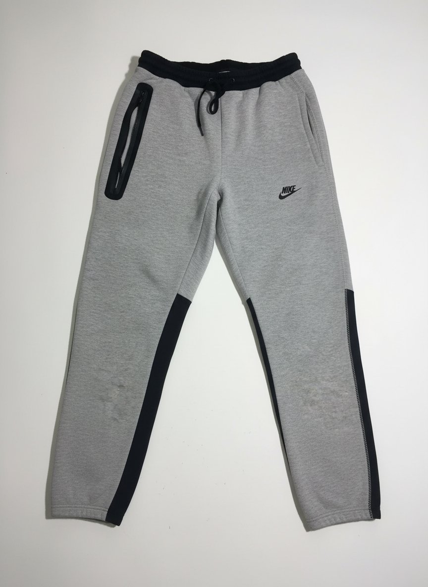 Pantalon nike tech gris