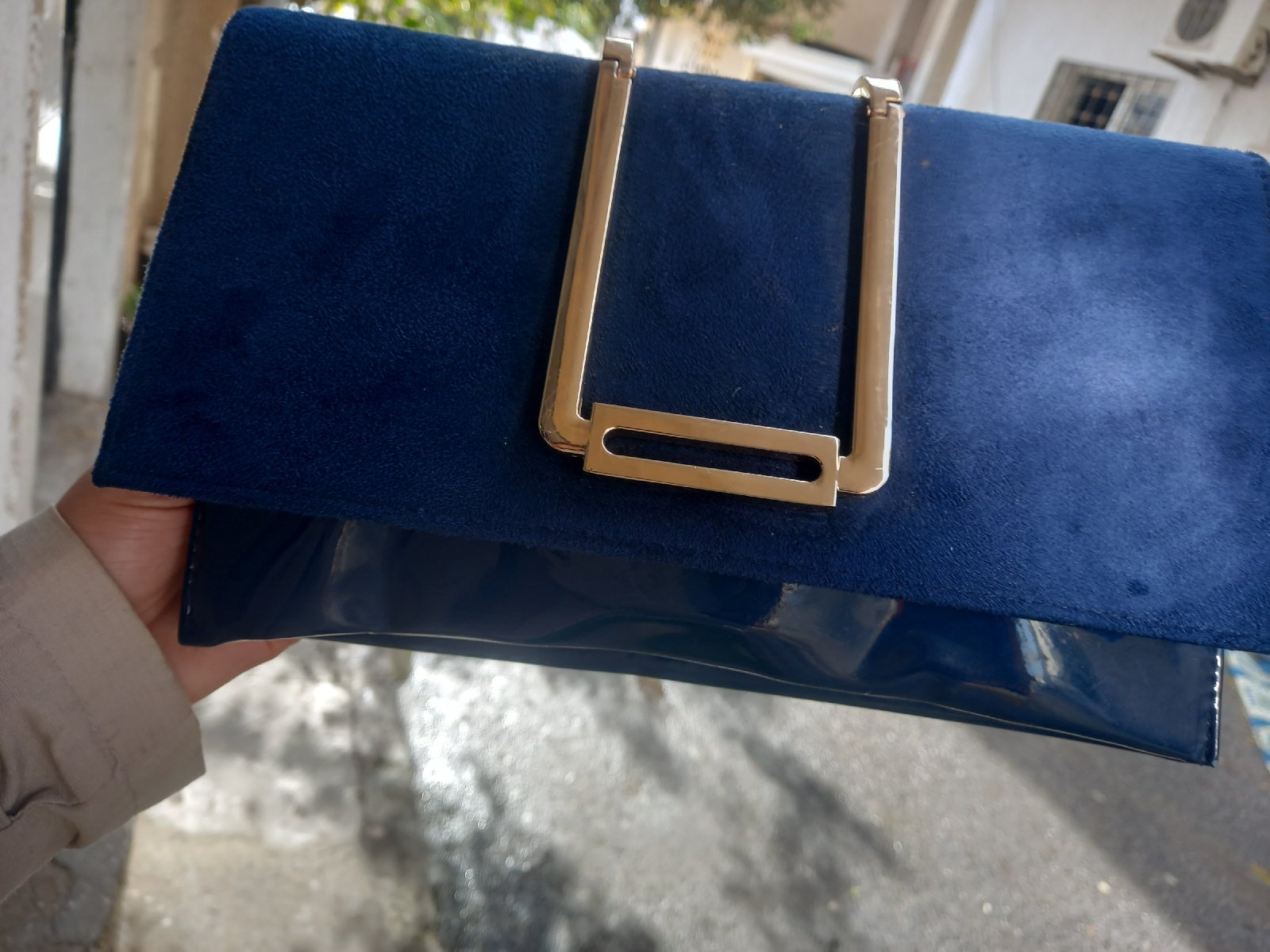 Pochette bleu petrol