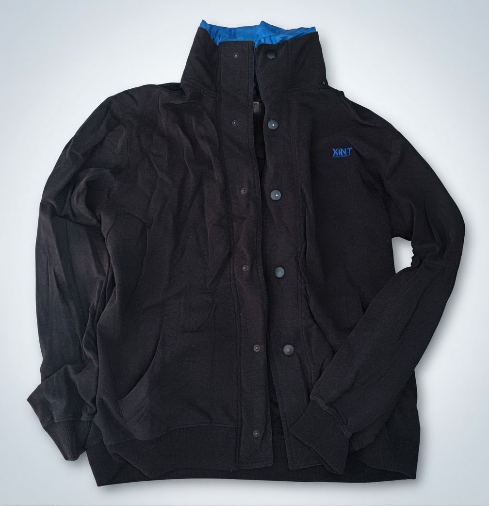 Veste Xint taille L tres bon etat