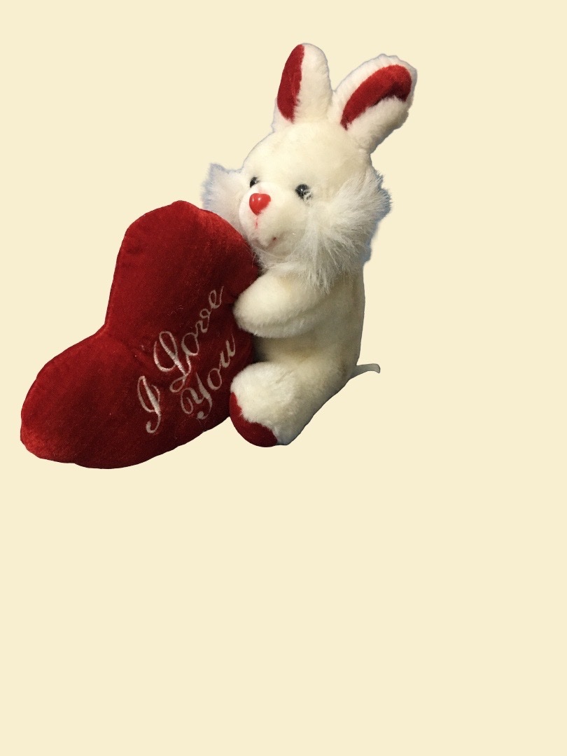 Peluche lapin avec coeur .