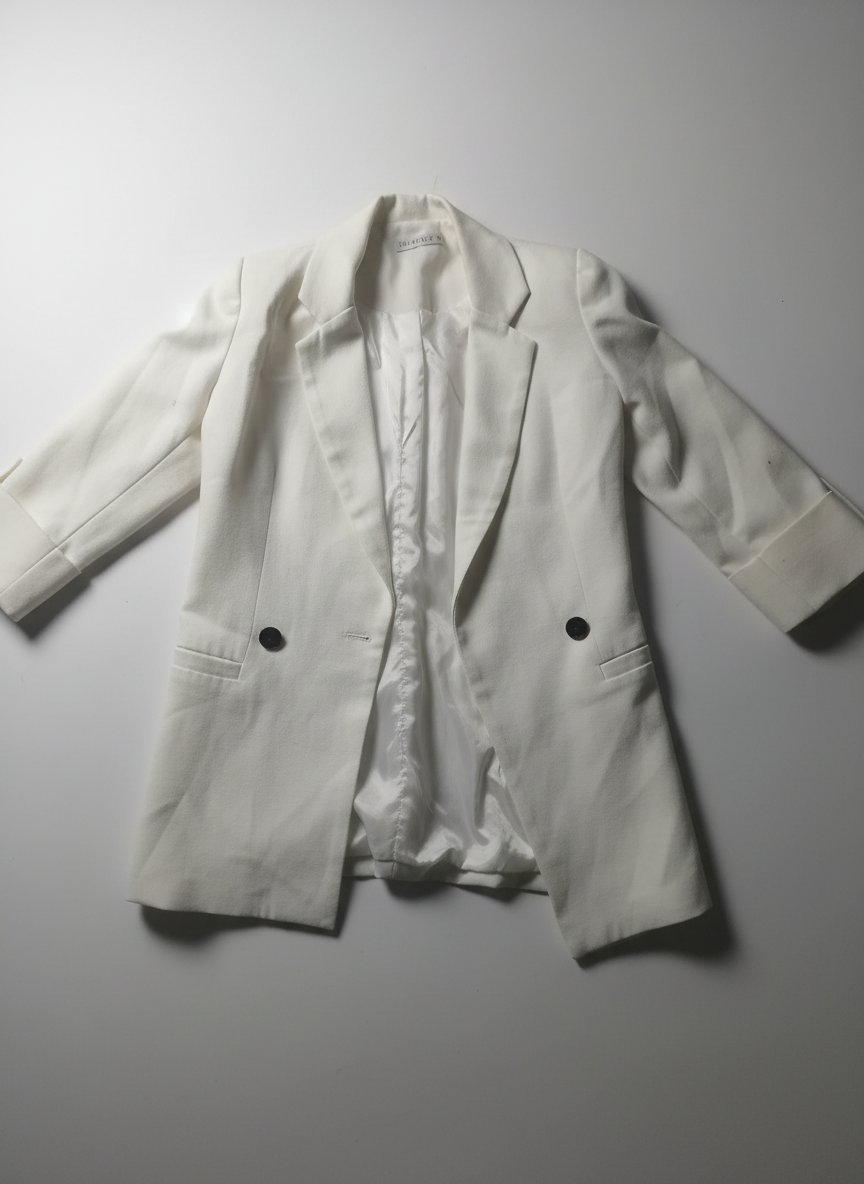 Blazer blanche avec des manches 3/4 taille 36