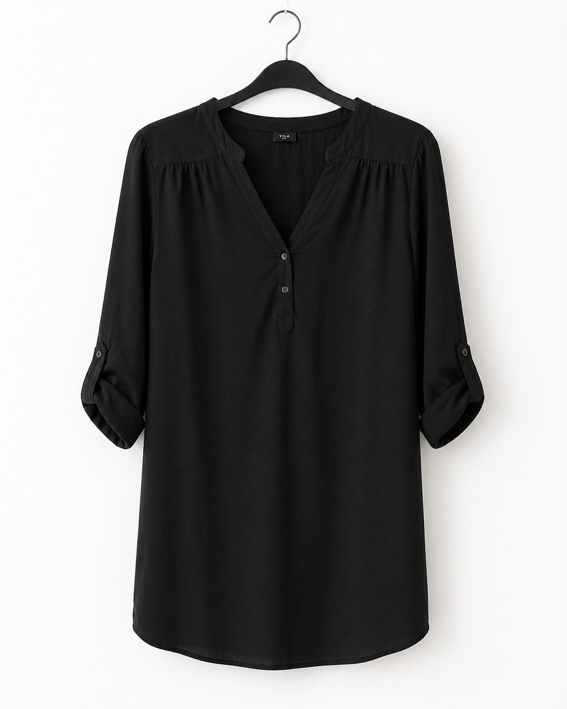 Élégante chemise noire pouvant être portée comme robe