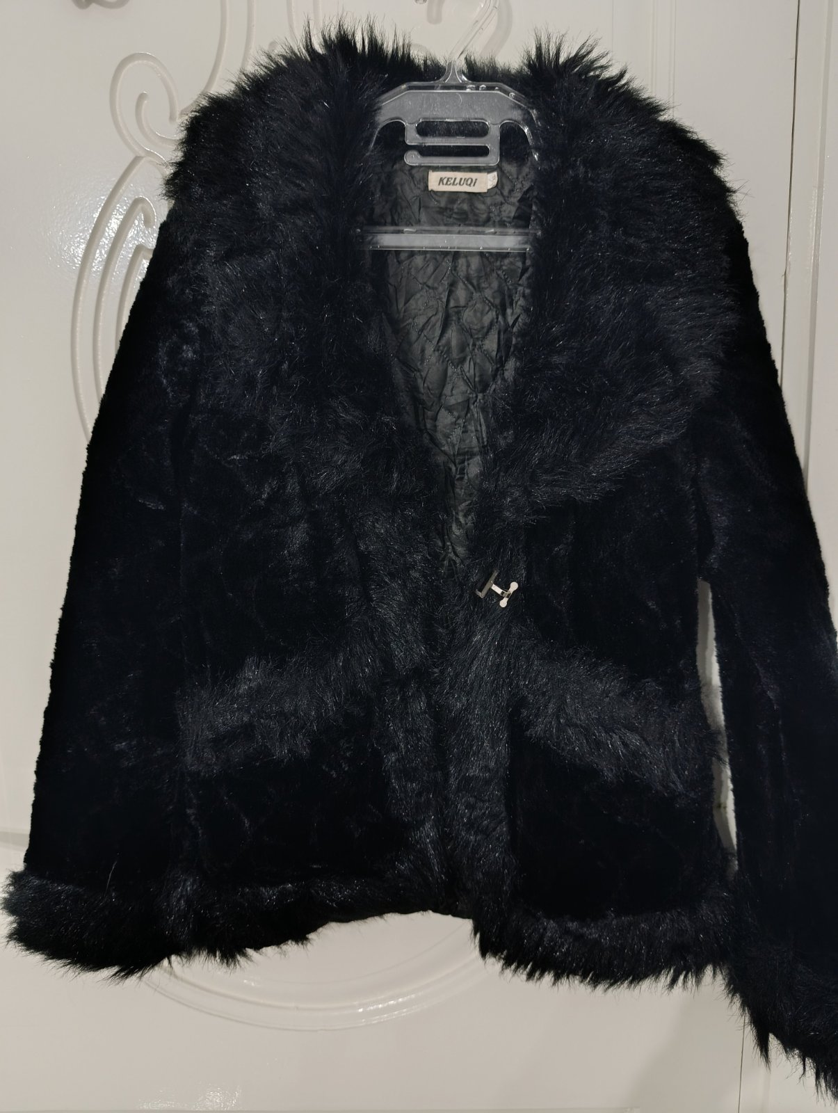 Veste courte noir en fausse fourrure taille L/XL