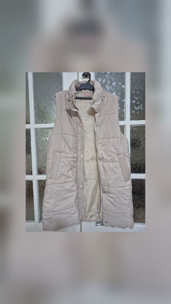 Veste sans manches courte bouffante