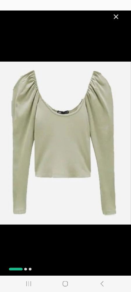 Un crop top zara avec manches bouffantes 