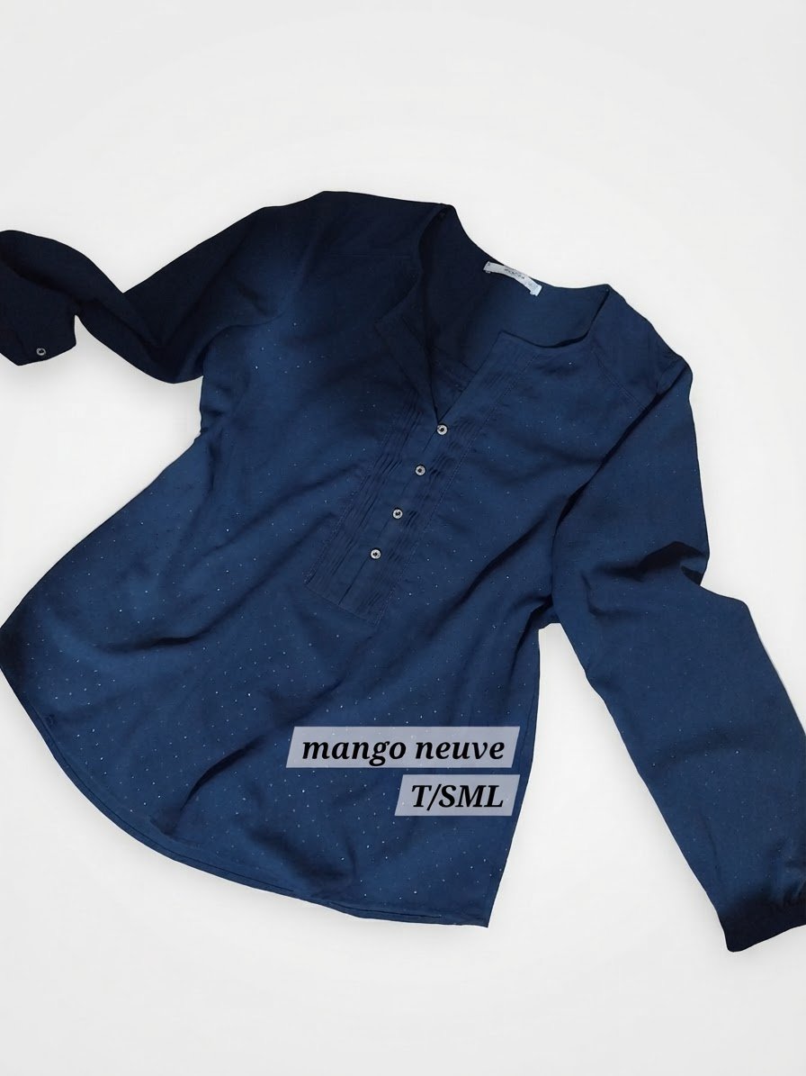 Tres belle chemise liquette mango mentionnée XS mais tlabes hatta MetL aussi grace à sa coupe assez large 