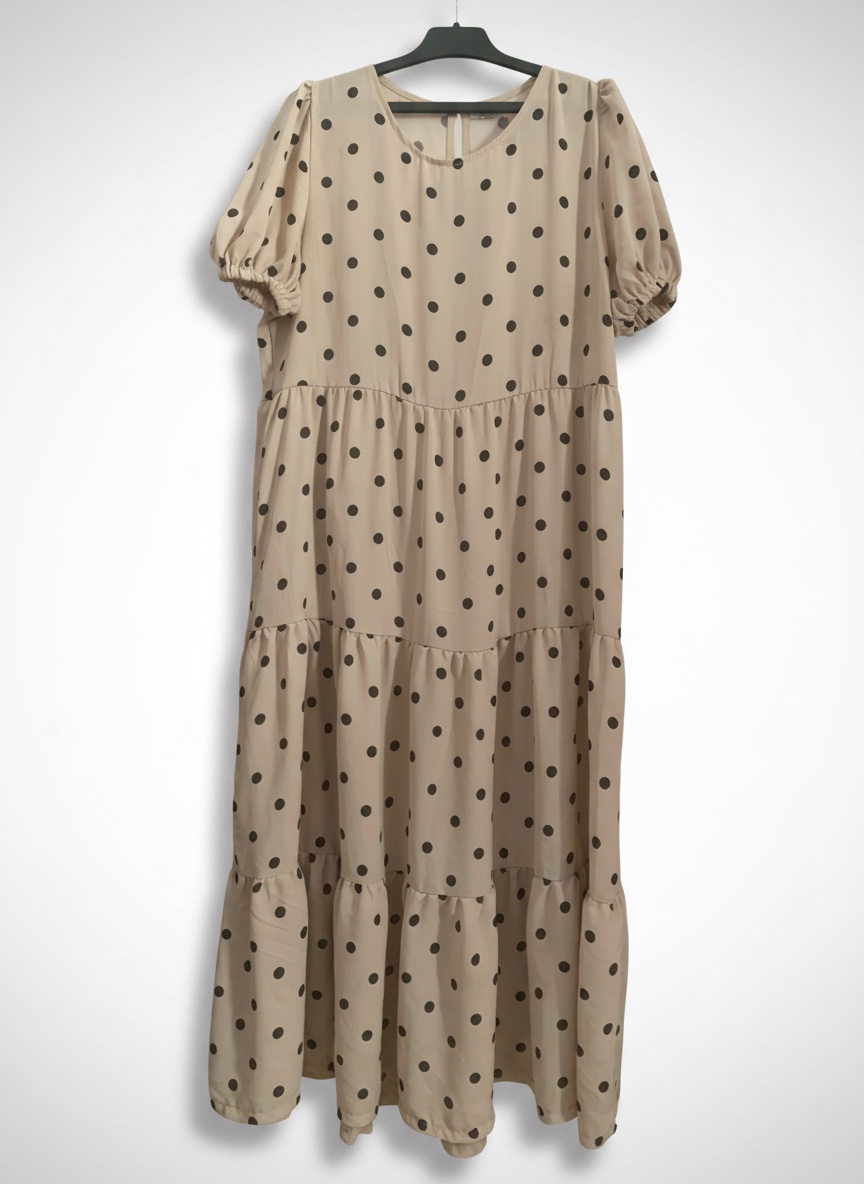 Robe beige à pois noirs