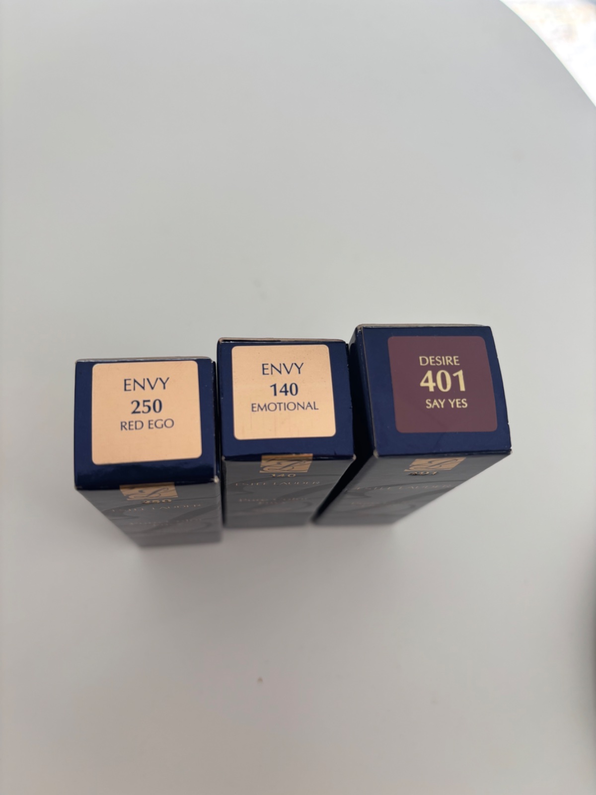 Trois rouges a levres Estee Lauder